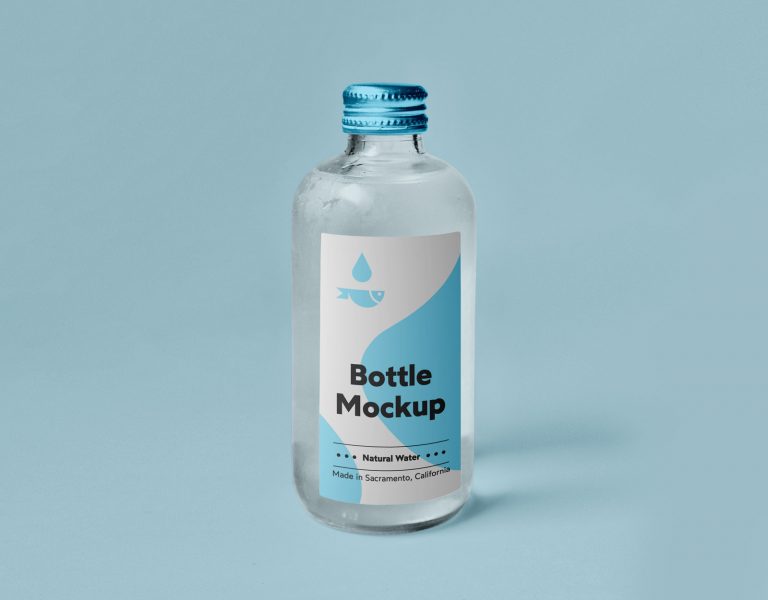 Free Small Cosmo Round Clear Glass Bottle Mockup