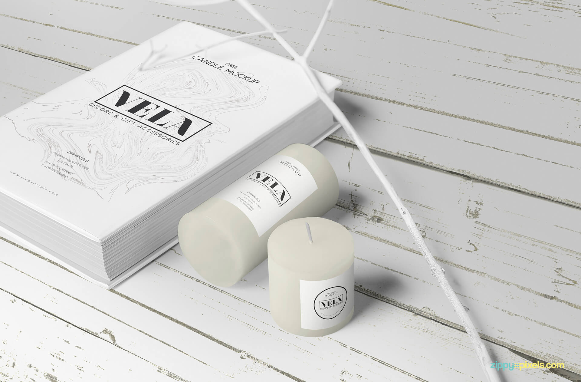 mockup featuring 2 candles and a book with label