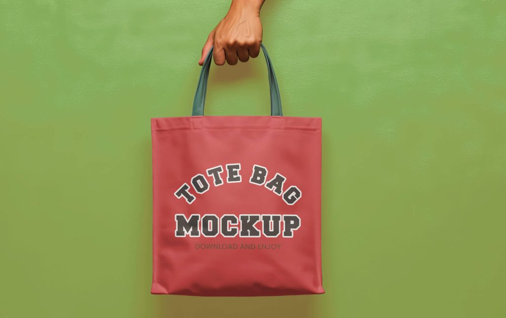 Hand Holding Tote Bag Mockup PSD1