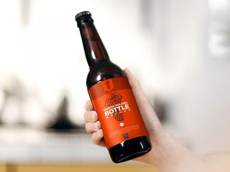 Hand Holding Beer Bottle with Lable Mockup