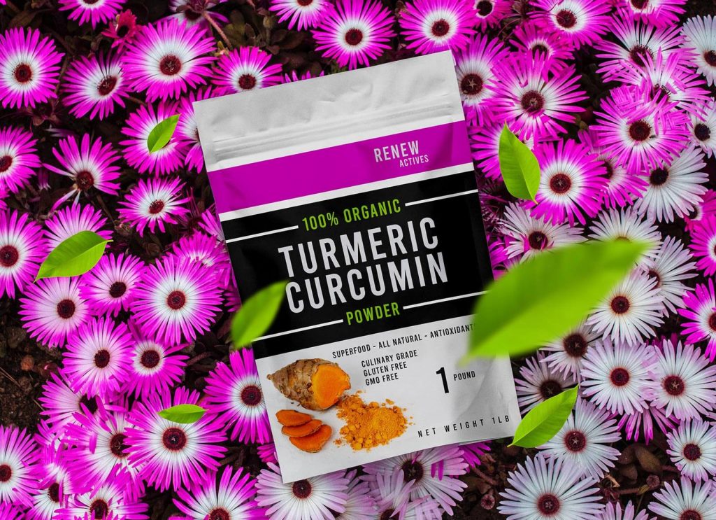 Free Standing Pouch On Flowers Scene Mockup