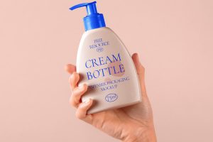 Hand Holding Cosmetic Mockup