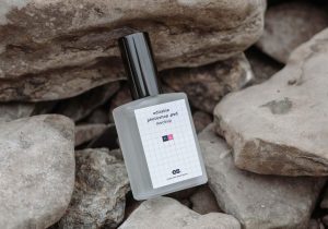 Perfume Bottle on Rocks Mockup