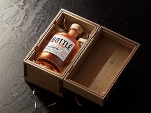 mockup showcasing unique bottle inside an opened box 1