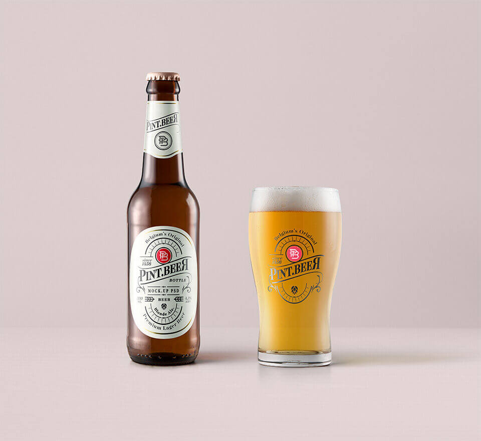amber beer bottle with a pint glass mockup