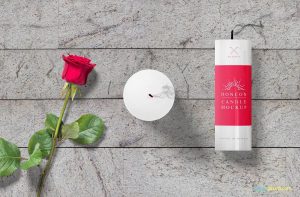 a pair of candles with a red rose mockup 1