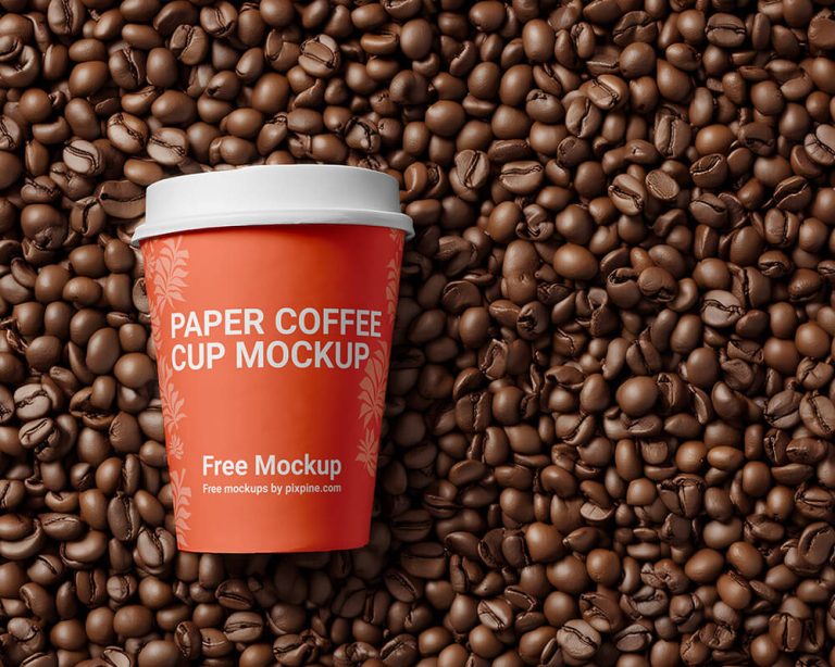 Free Paper Cup on Coffee Beans Mockup 1