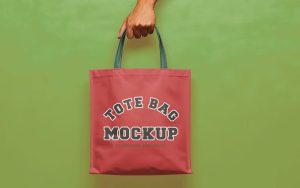 Hand Holding Tote Bag Mockup PSD1