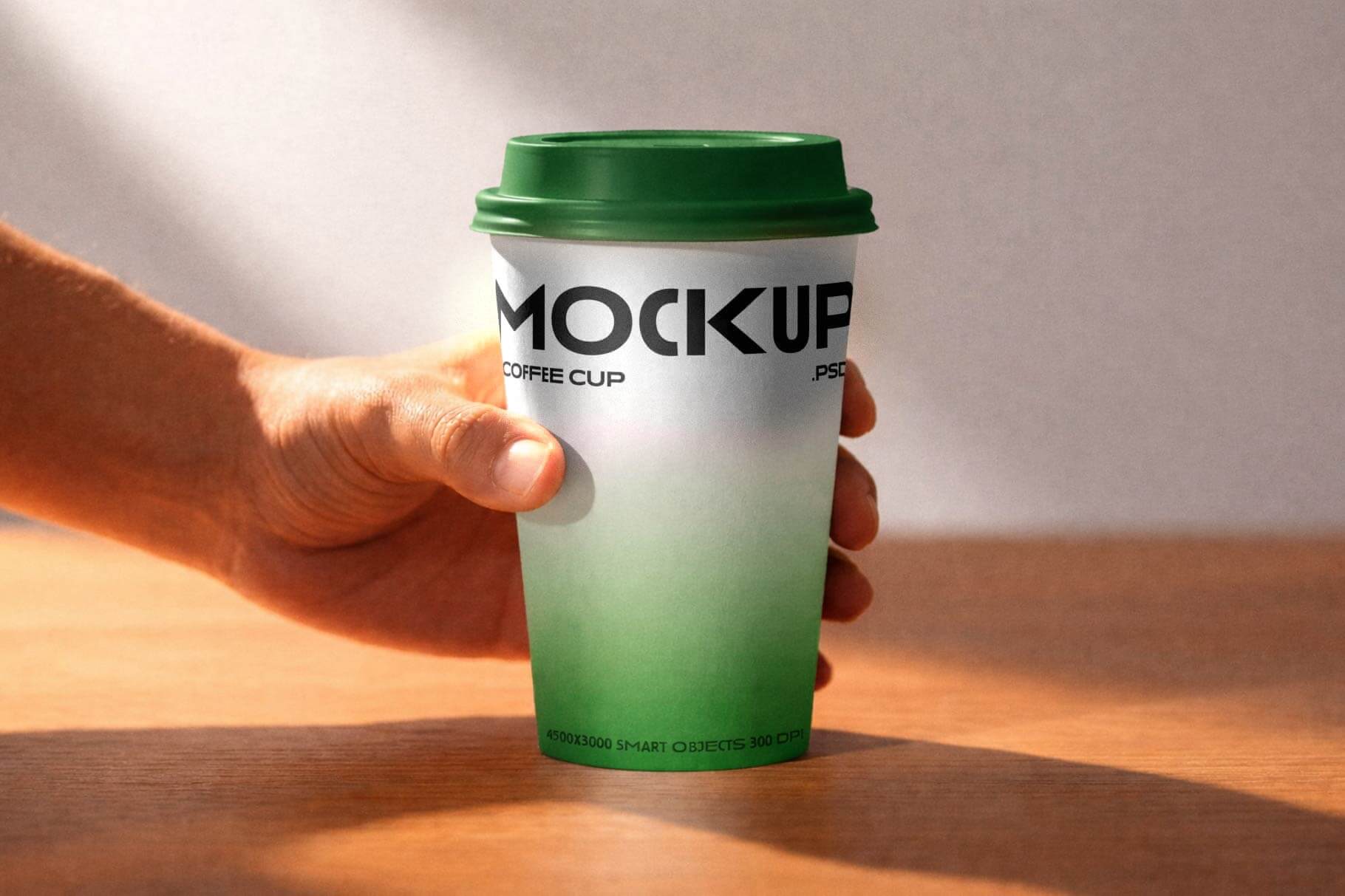 Free Takeaway Coffee Cup Mockup PSD (Hand Holding Cup Scene)