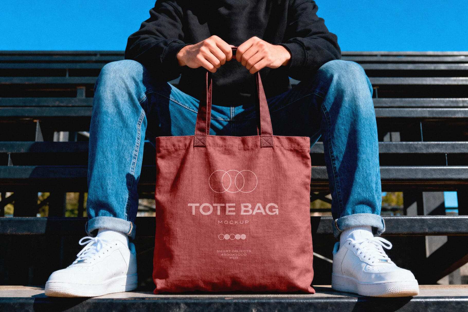 Free Hand Holding Canvas Tote Bag Mockup PSD1